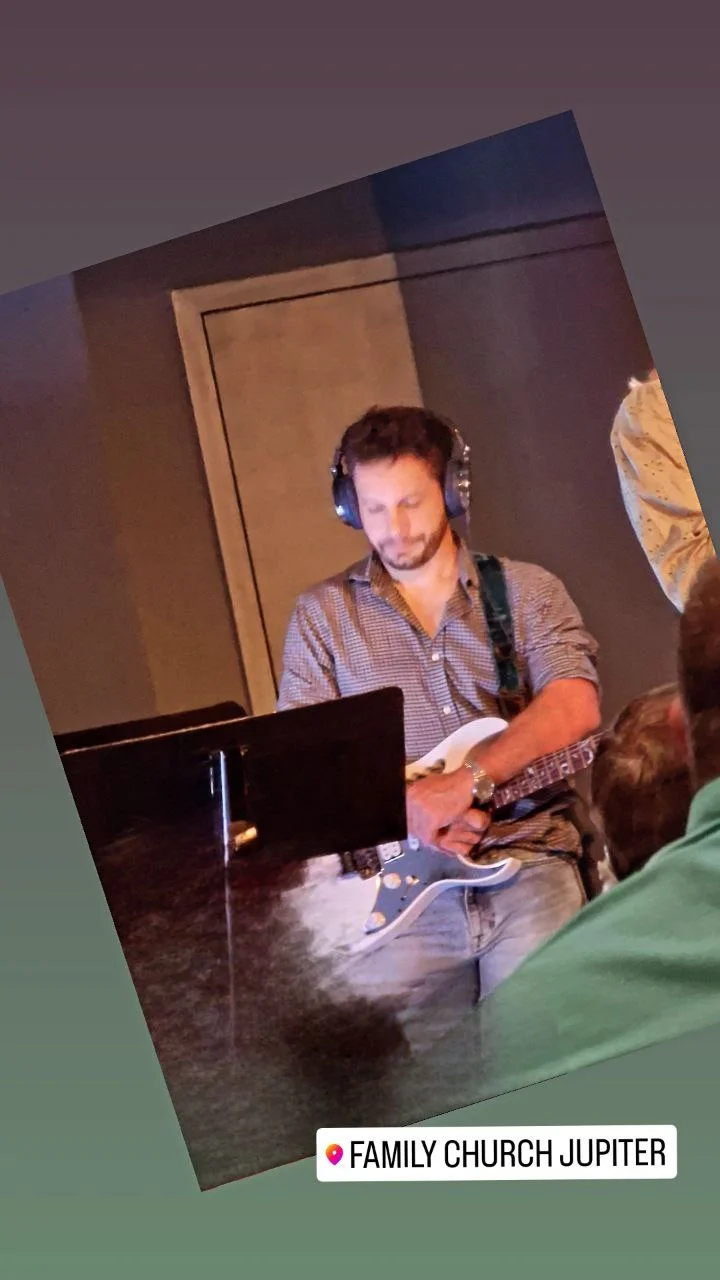 Playing guitar at church